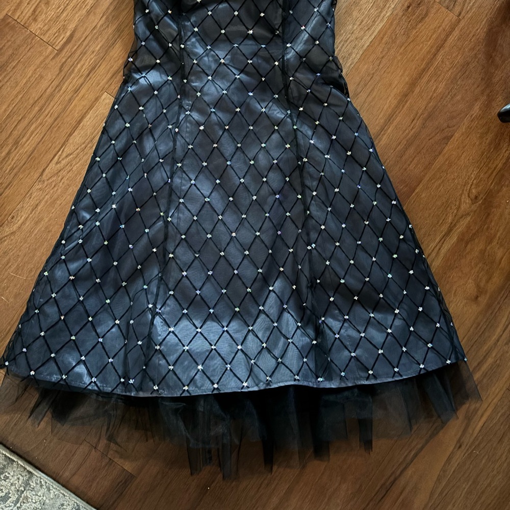 Black cocktail length dress